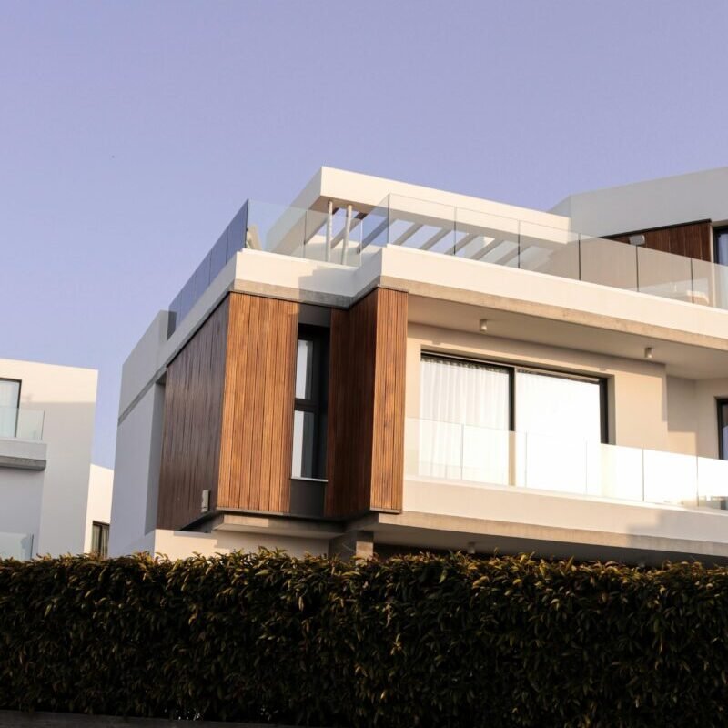 Luxury villa exterior shot at daytime with elegant design.